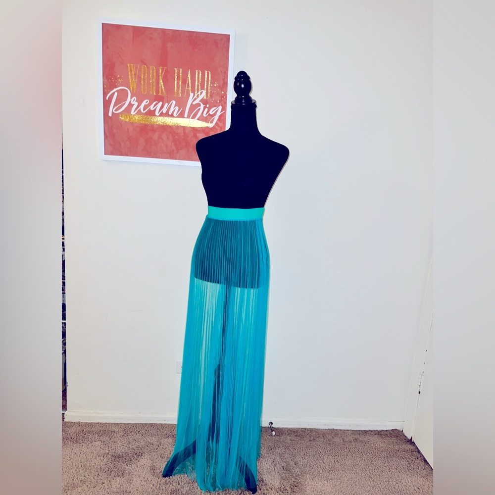 Sheer 100% polyester skirt.